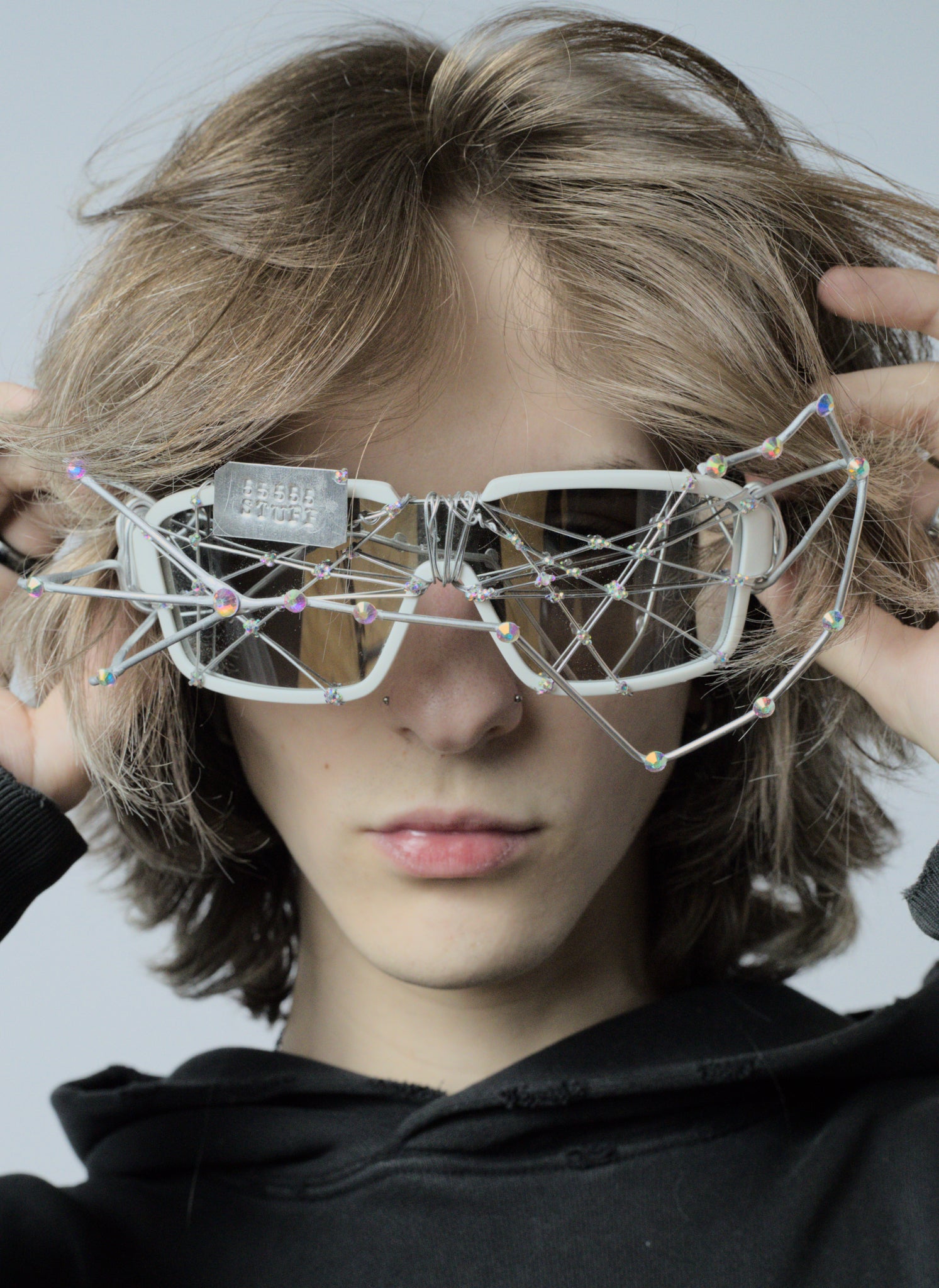 Model wearing designer sunglasses