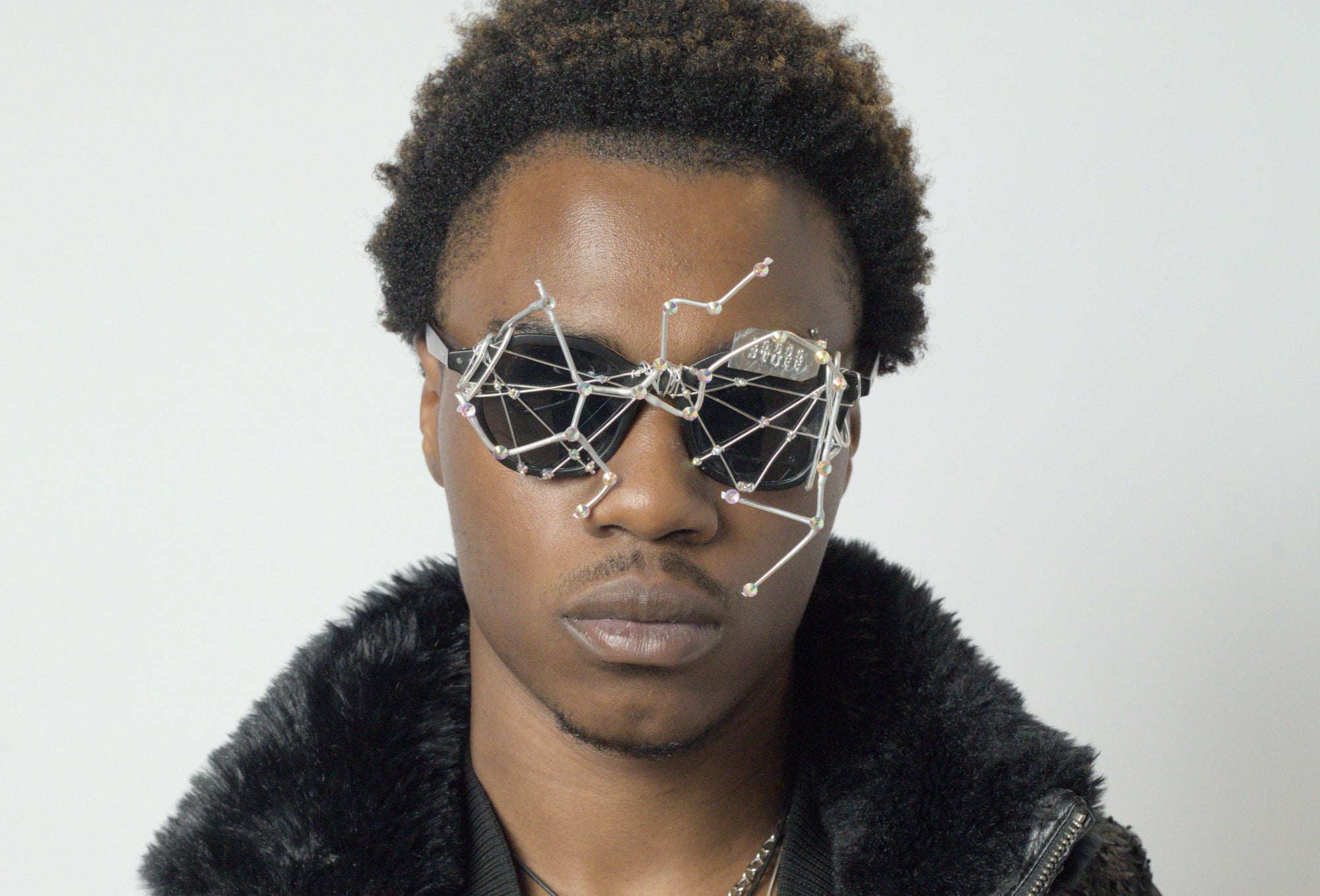 Model wearing designer sunglasses