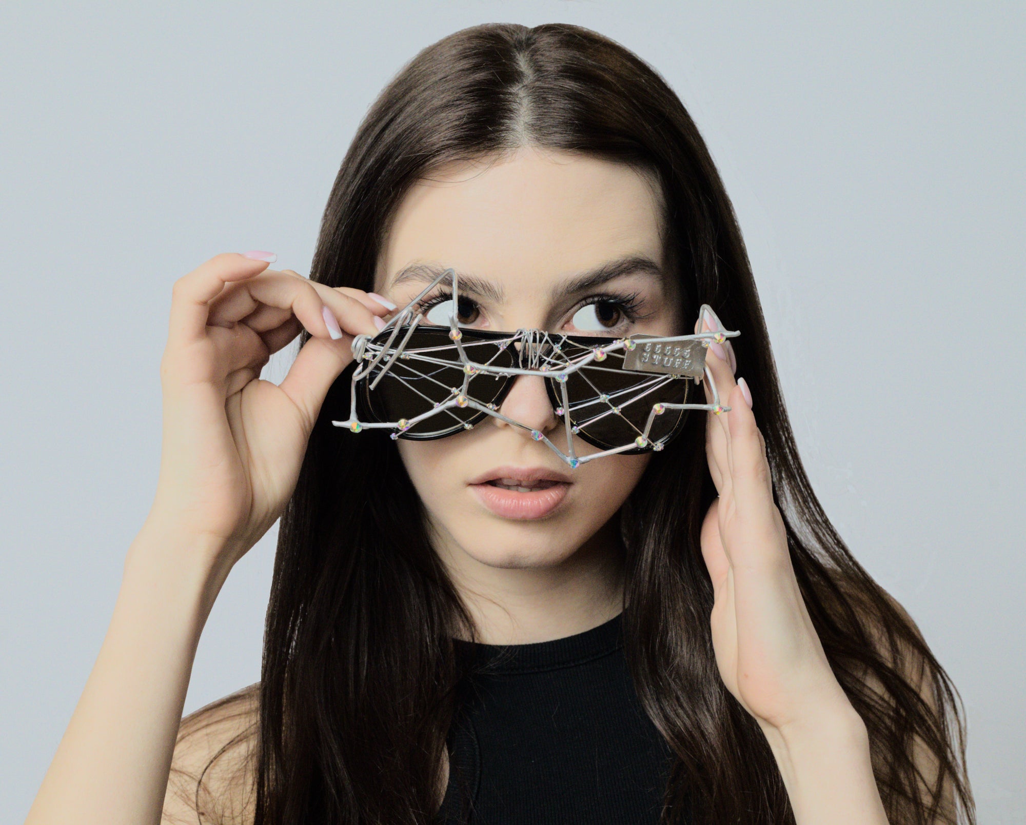 Model wearing designer sunglasses